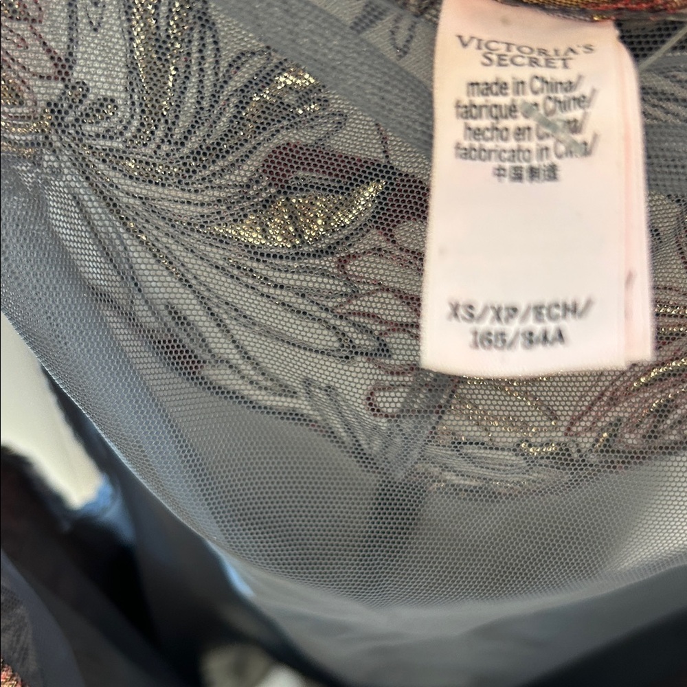 Victoria's Secret Black and Gold Sheer Top body suit perfect fo your night out